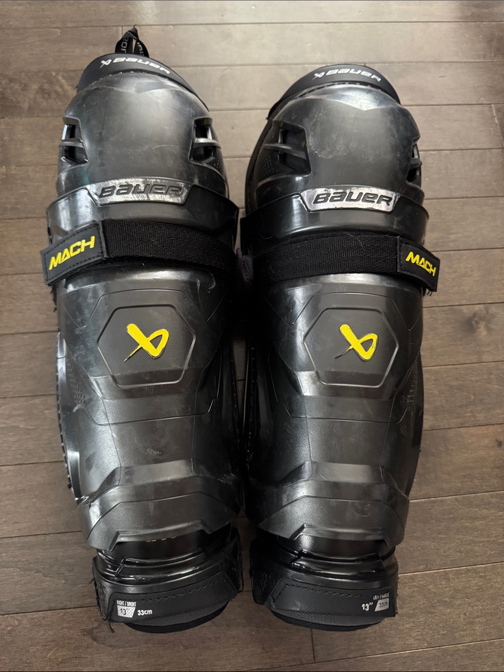 Bauer Black and Yellow Men’s Mach Hockey Shin Guards